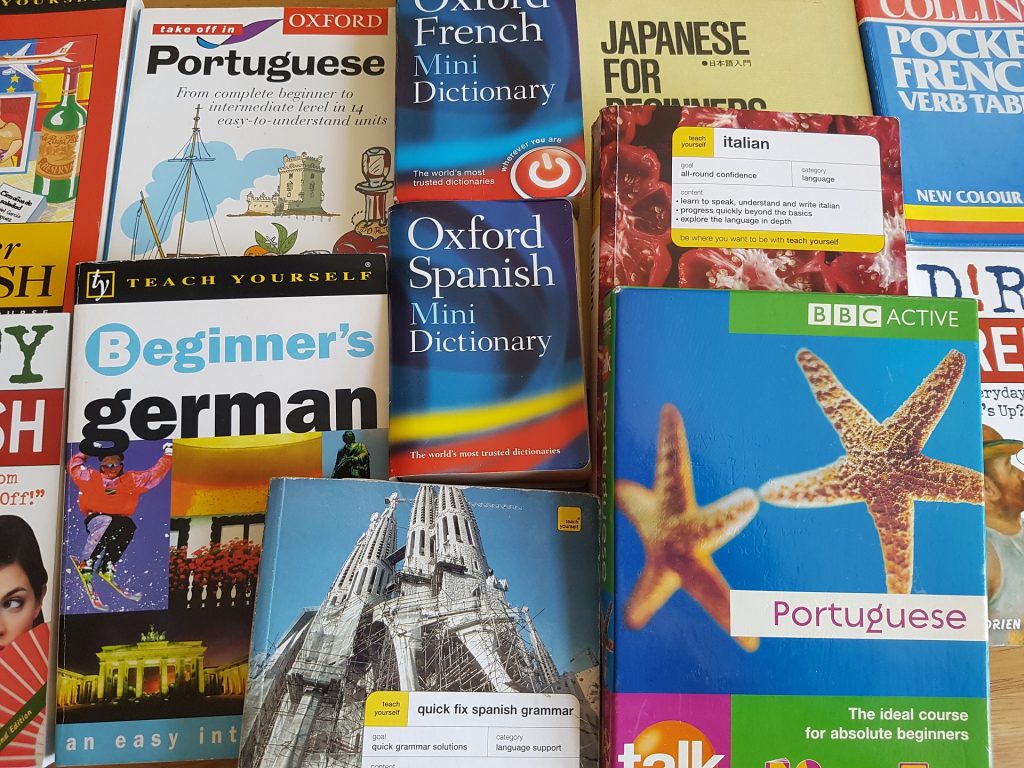A range of phrasebooks, dictionaries and language-learning resources: what we learn before we go can contribute to ethical travel decisions