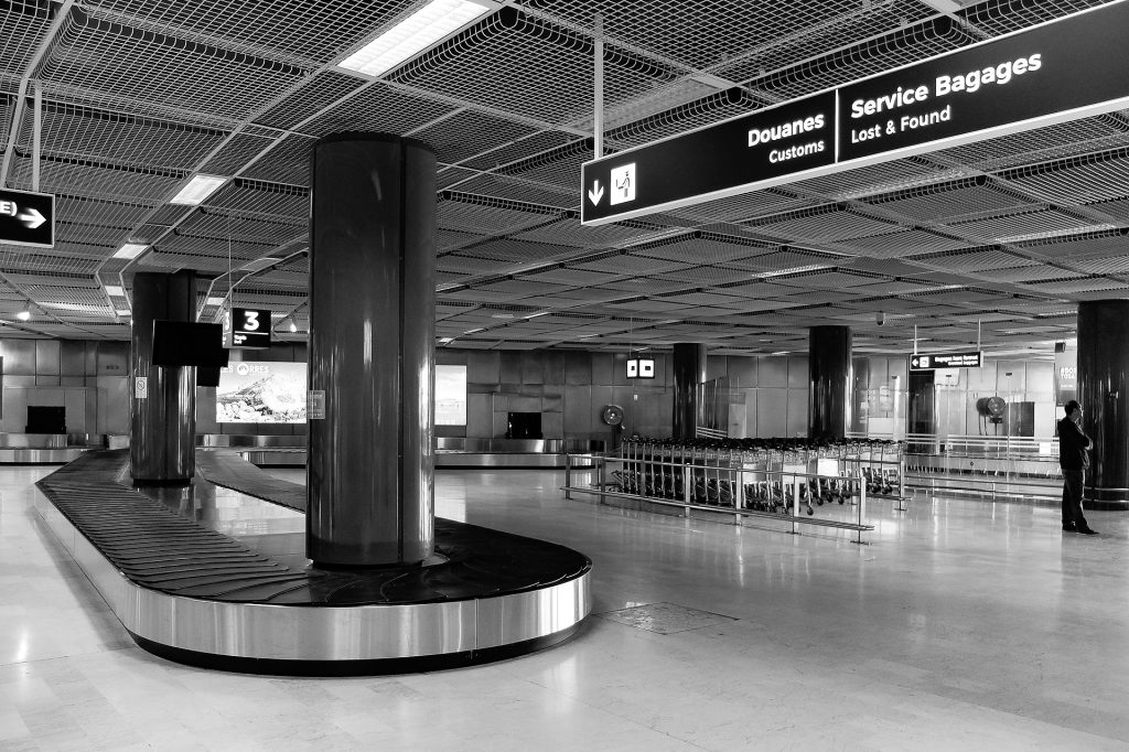Empty baggage carousel - Cancel for Any Reason - WorldKind